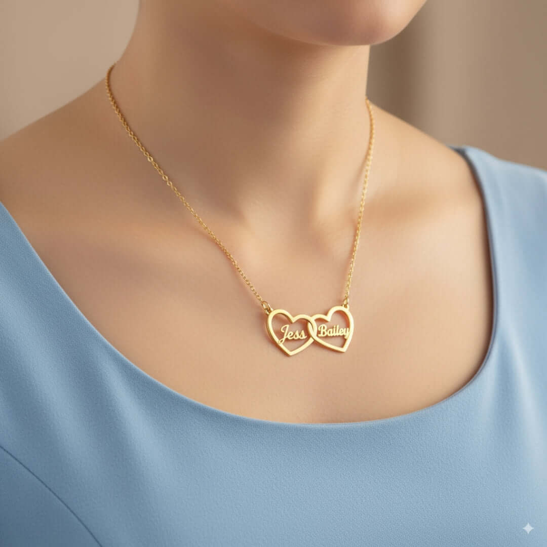 Two Hearts Necklace in gold with personalized engravings, symbolizing love and bond.