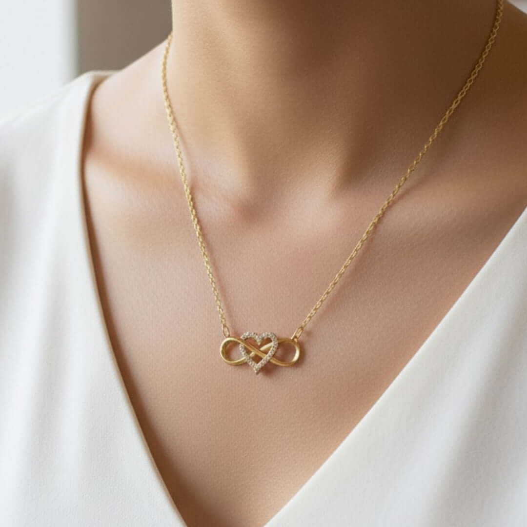 Elegant Infinite Love Necklace in gold with heart charm, symbolizing eternal affection and perfect as a girlfriend gift.