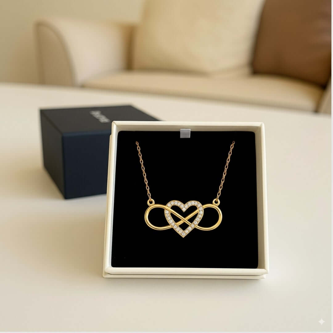 Gold Infinite Love Necklace featuring infinity symbol and heart on display, ideal girlfriend gift for birthday or Valentine's.