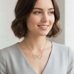 Two Hearts Necklace in rose gold with personalized engraving, symbolizing love and bond.