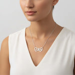 Two Hearts Necklace featuring personalized engraving in Silver, symbolizing love and bond.